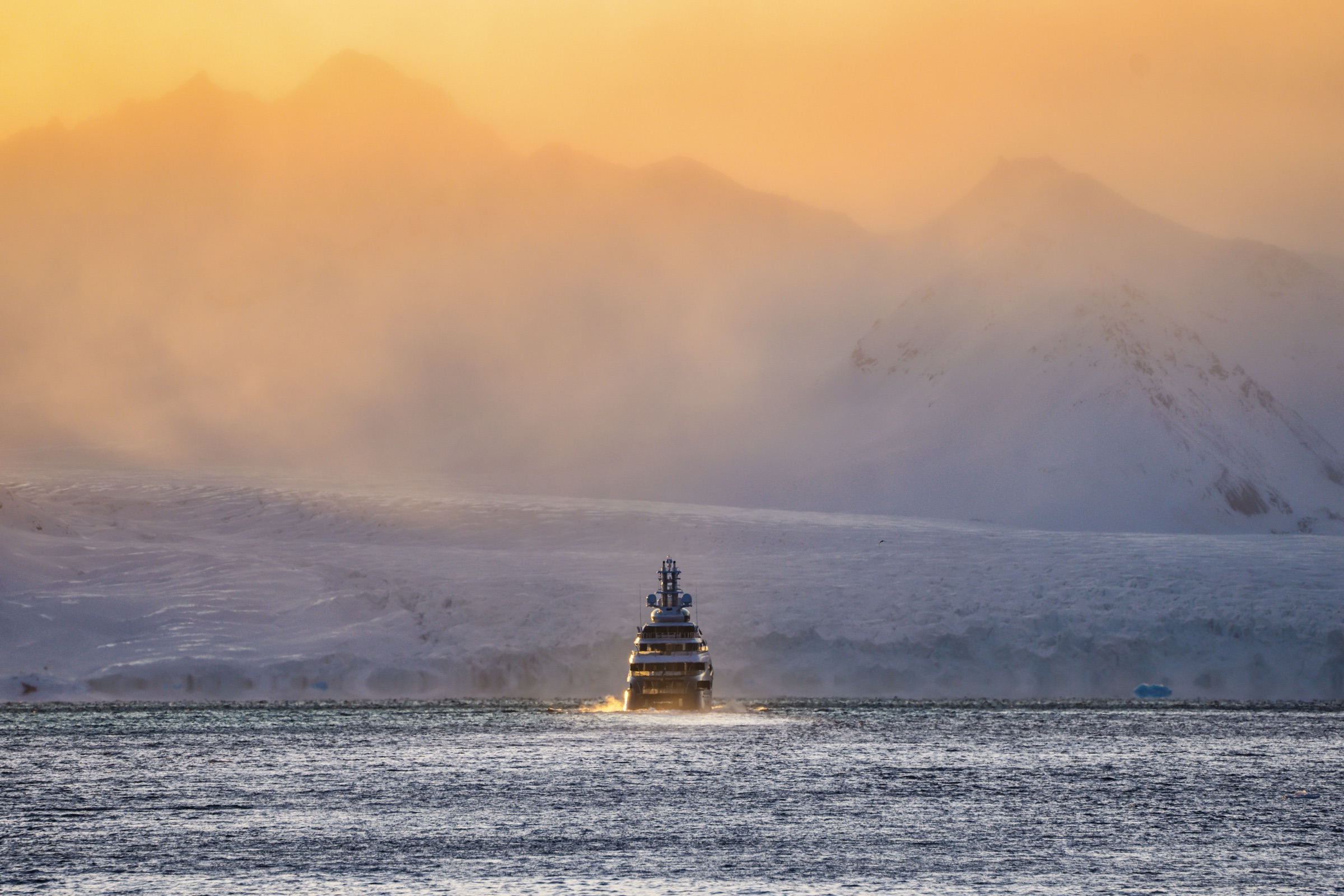 Expedition yacht in arctic sunset